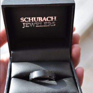 Never-been-worn tungsten men’s wedding band